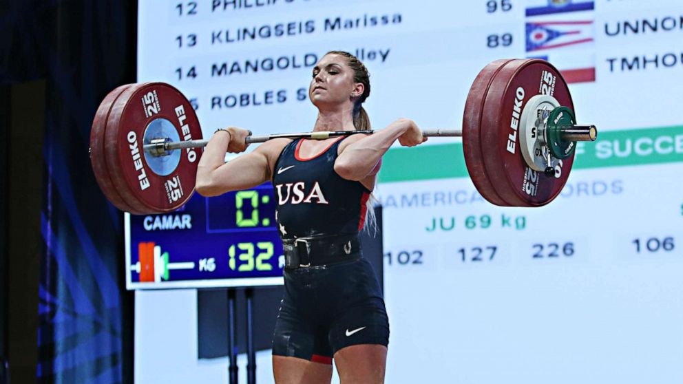 PHOTO: Mattie Rogers competes in the  women's 69kg clean and jerk weight class at the USA Olympic Team Trials for weightlifting at the Calvin L. Rampton Convention Center on May 8, 2016, in Salt Lake City, Utah.
