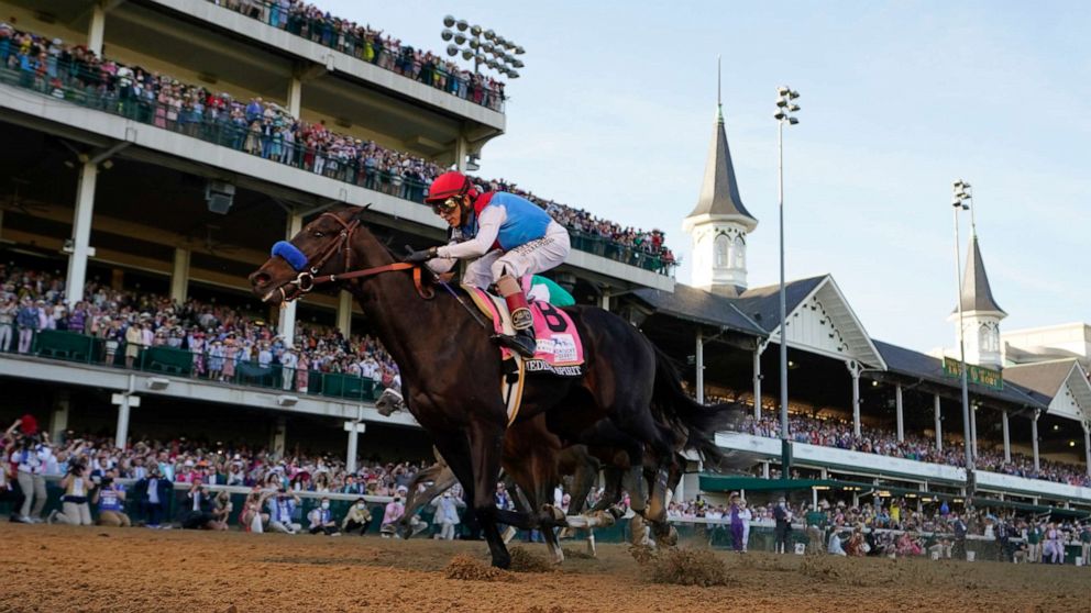 PHOTO: John Velazquez riding Medina Spirit crosses the finish line to win the 147th running of the Kentucky Derby at Churchill Downs in Louisville, Ky., May 1, 2021.