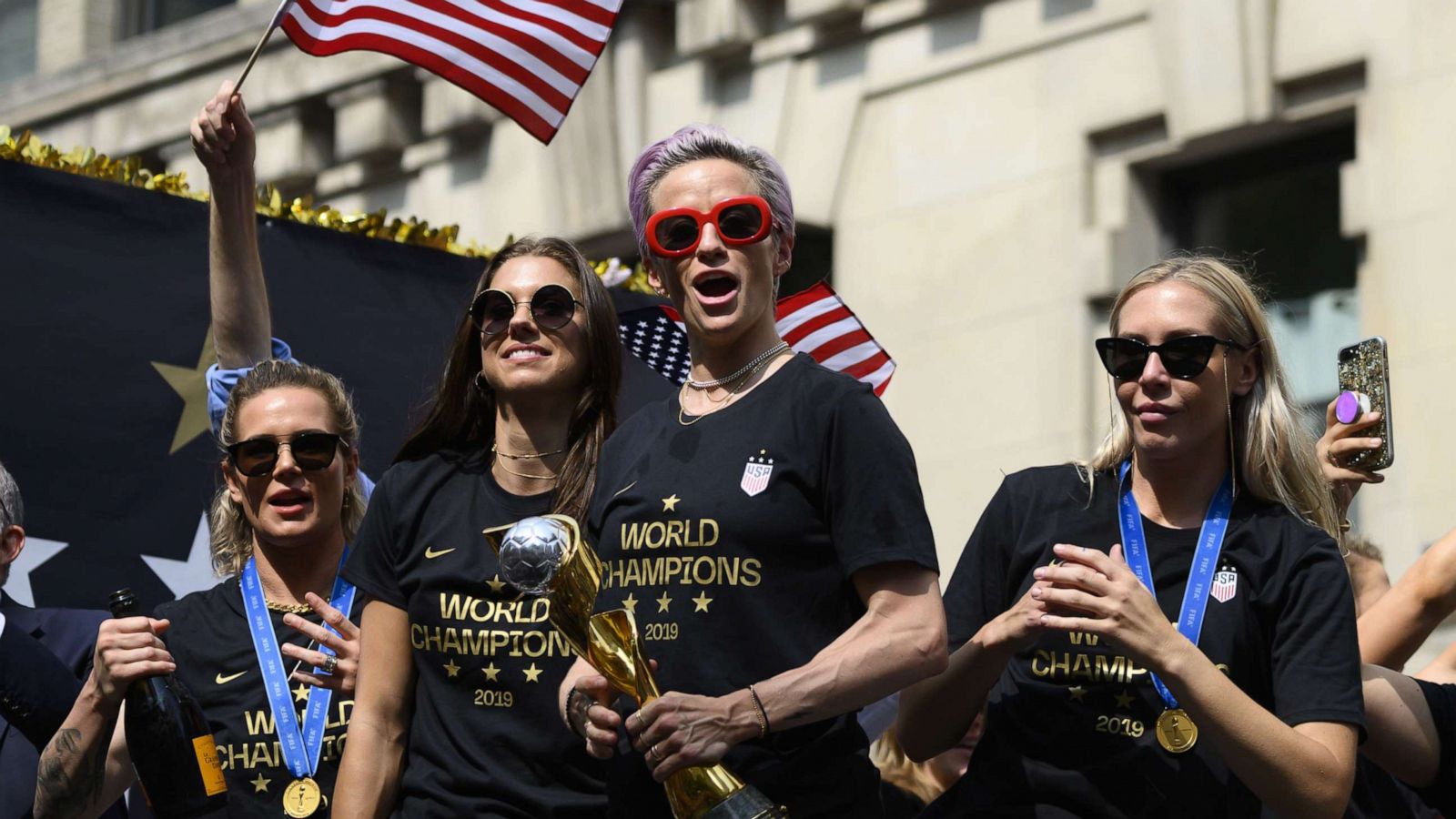 PHOTO: In this file photo taken on July 10, 2019, Megan Rapinoe, center, and other members of the World Cup-winning U.S. women's team take part in a ticker tape parade for the women's World Cup champions in New York.