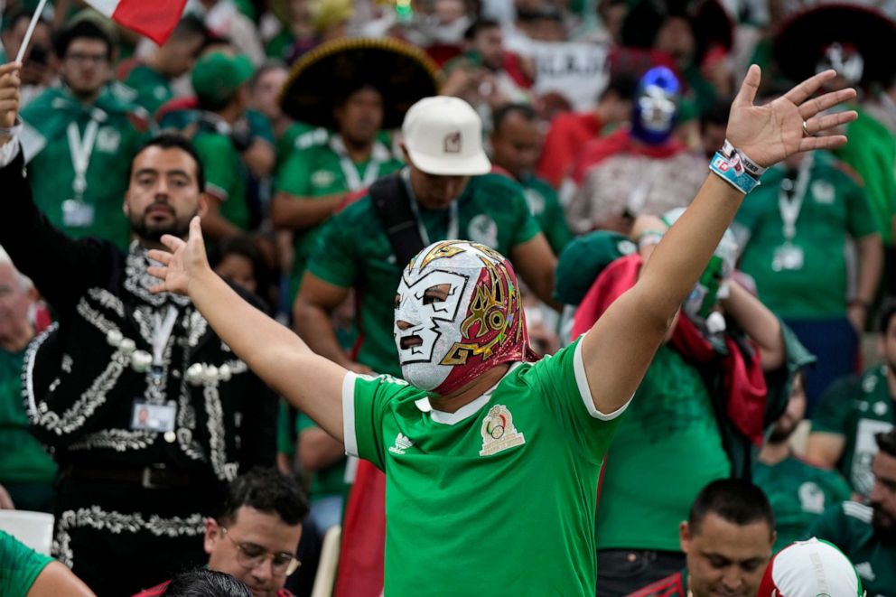 PHOTO: Mexico supporters on the stands wait for the start of the World Cup group C soccer match between Saudi Arabia and Mexico, at the Lusail Stadium in Lusail, Qatar, Wednesday, Nov. 30, 2022.