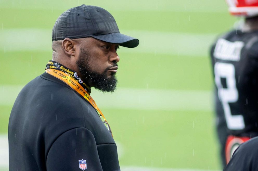 PHOTO: In this Feb 2, 2022, file photo, Pittsburgh Steelers head coach Mike Tomlin visits the field during  practice for the 2022 Senior Bowl, in Mobile, Ala.