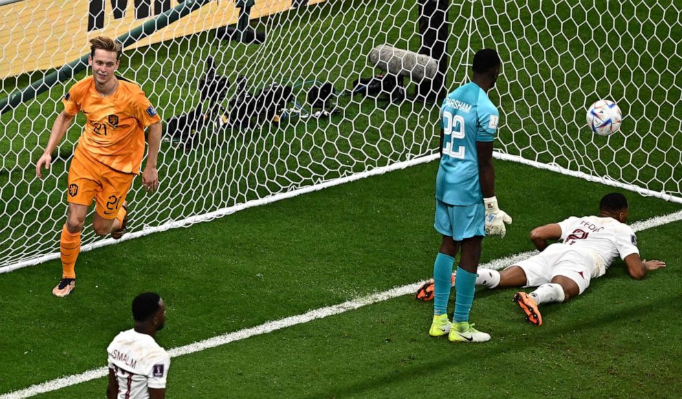 PHOTO: Netherlands' midfielder Frenkie De Jong celebrates scoring his team's second goal during the Qatar 2022 World Cup Group A football match between the Netherlands and Qatar at the Al-Bayt Stadium in Al Khor, north of Doha on Nov. 29, 2022.