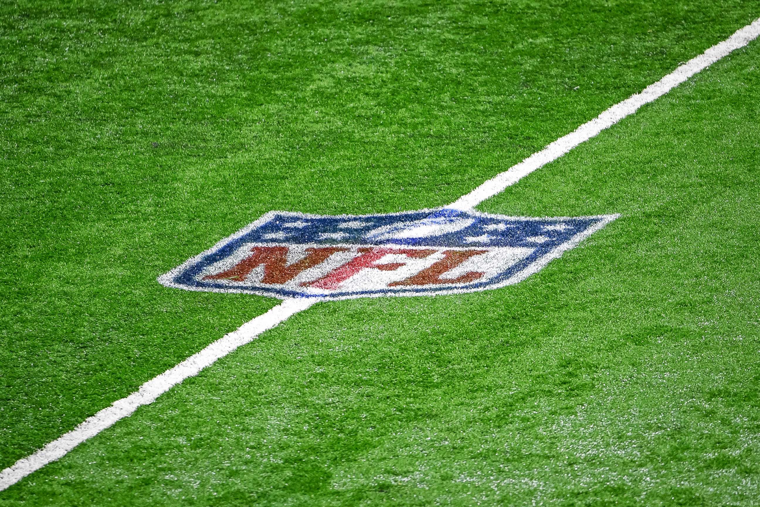 PHOTO: The NFL logo is pictured midfield during a football game. 