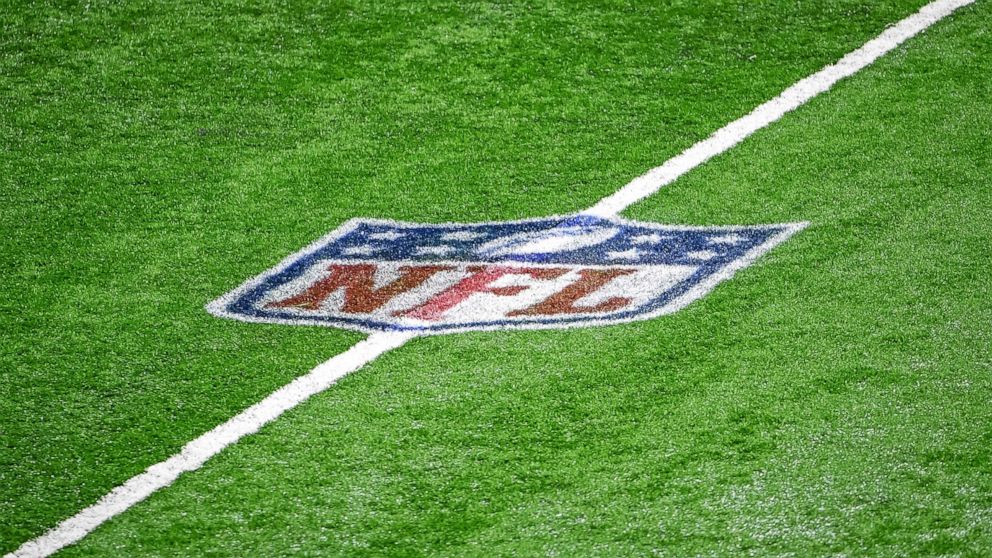 PHOTO: The NFL logo is pictured midfield during a football game. 