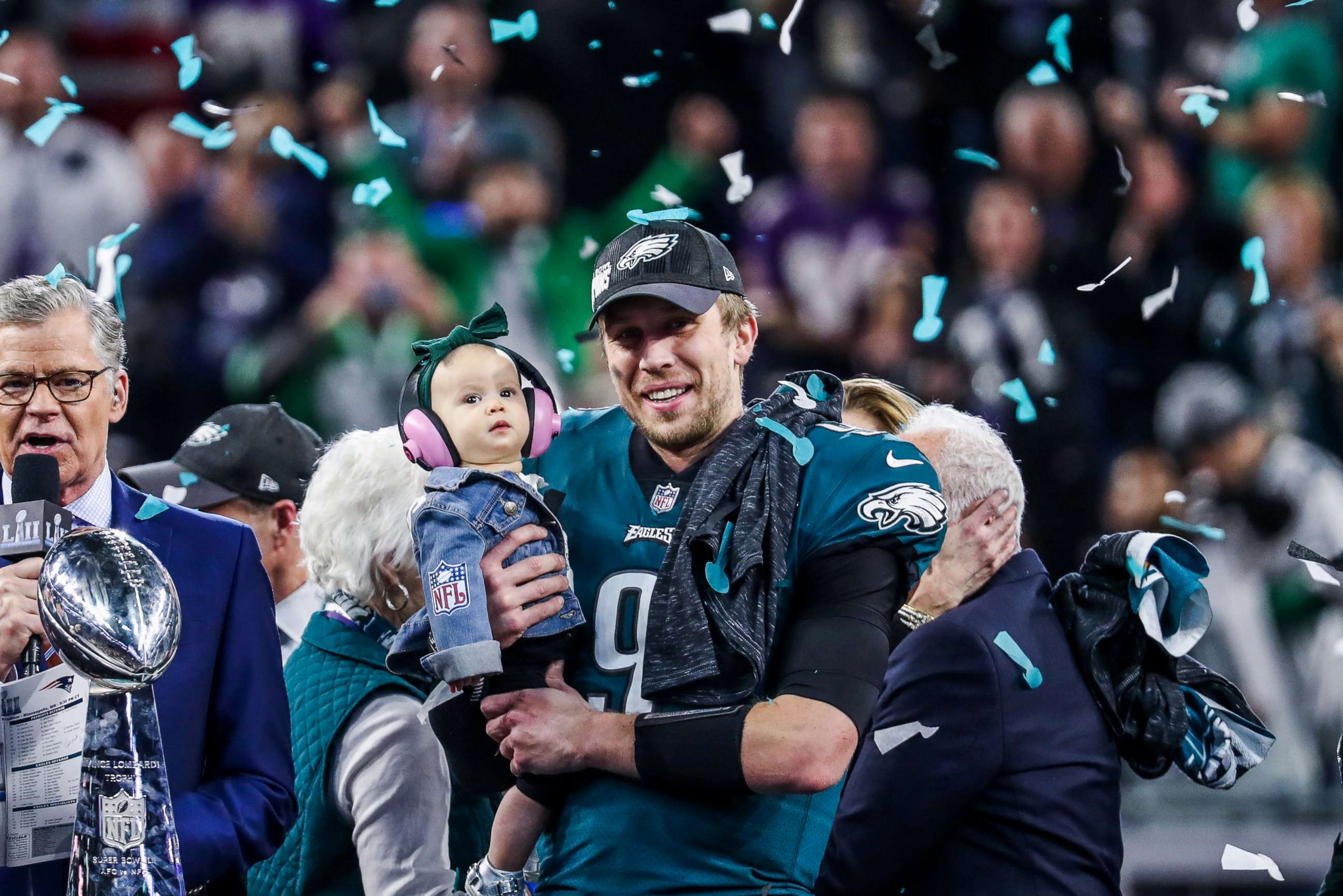 PHOTO: Philadelphia Eagles quarterback Nick Foles (#9) and his daughter Lily James Foles celebrate with the Vince Lombardi trophy after defeating the New England Patriots 41- 33 at Super Bowl LII at U.S. Bank Stadium in Minneapolis, Feb. 4, 2018.