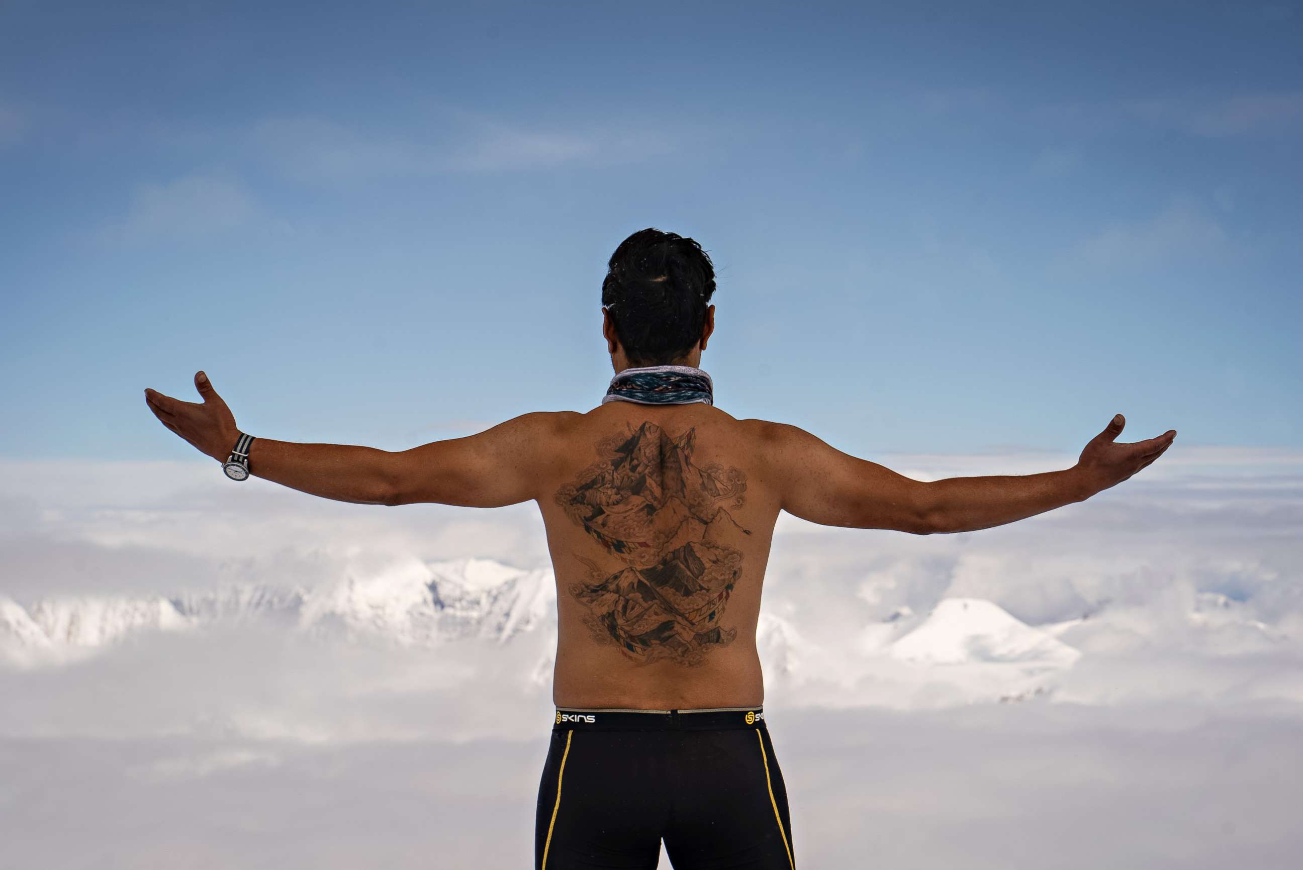 PHOTO: The tattoo across Nims Purja's back celebrates all 14 8,000-meter peaks. The ink is made of DNA from his wife, parents, and siblings.