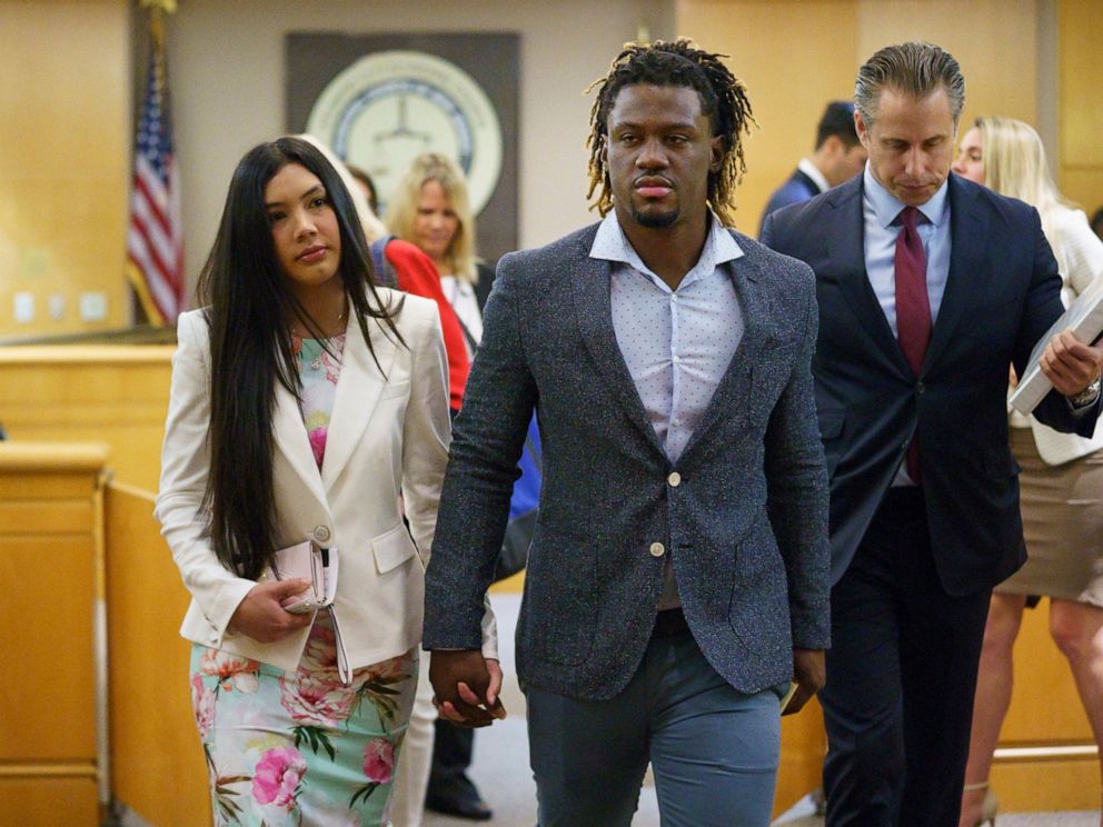PHOTO: Philadelphia Phillies baseball player Odubel Herrera leaves a courtroom with an unidentified friend after a hearing on a domestic violence case in Atlantic City, N.J., Wednesday, July 3, 2019.