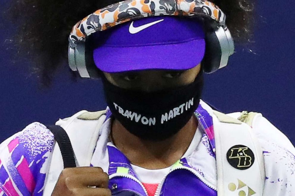 PHOTO: Naomi Osaka walks out wearing a mask with the name of Trayvon Martin on it before her women's singles fourth-round match against Anett Kontaveit at the U.S. Open on Sept. 6, 2020, in New York City.