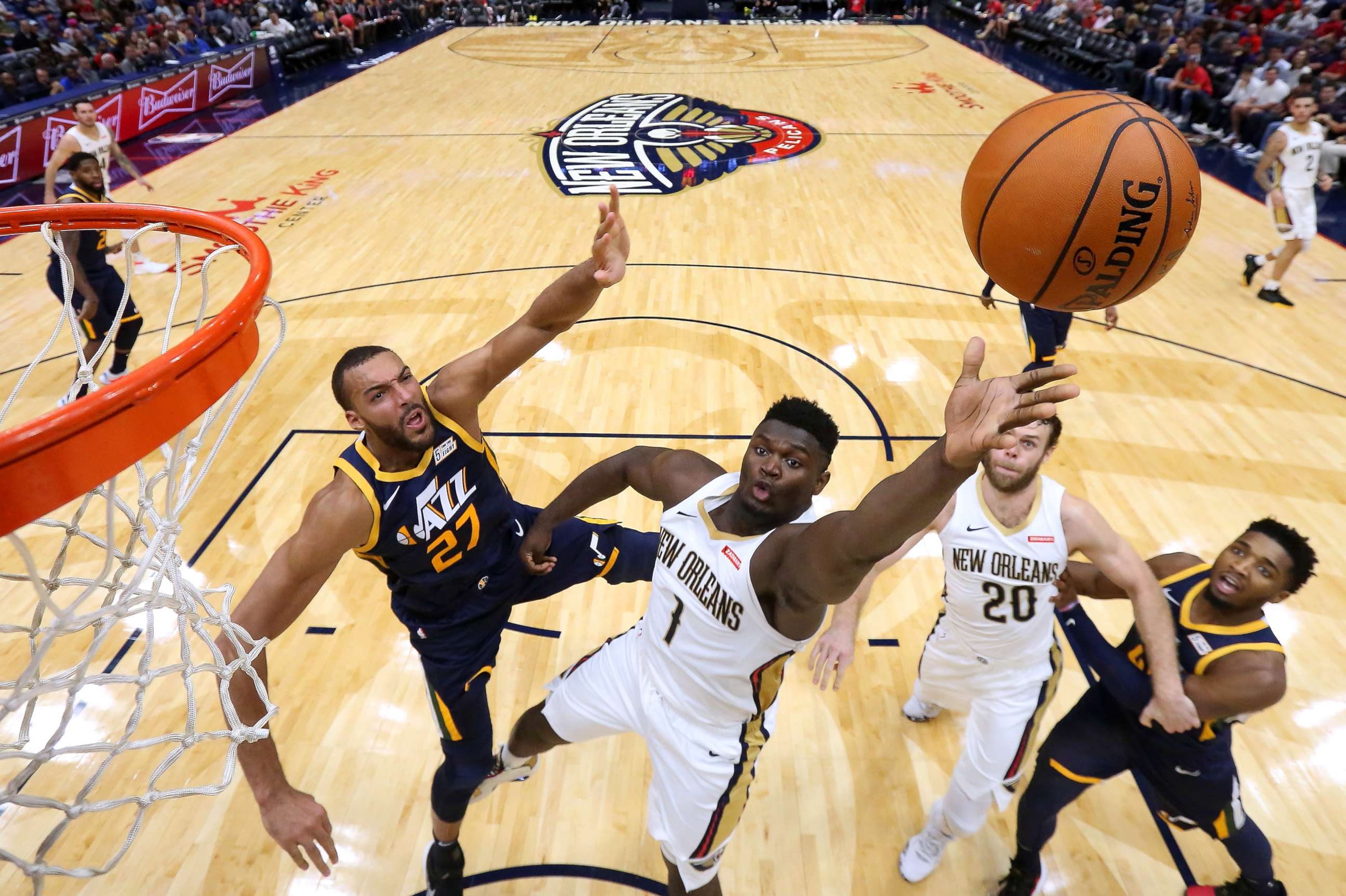 PHOTO: Zion Williamson #1 of the New Orleans Pelicans shoots against Rudy Gobert #27 of the Utah Jazz during the second half of a game at the Smoothie King Center on October 11, 2019 in New Orleans, Louisiana.
