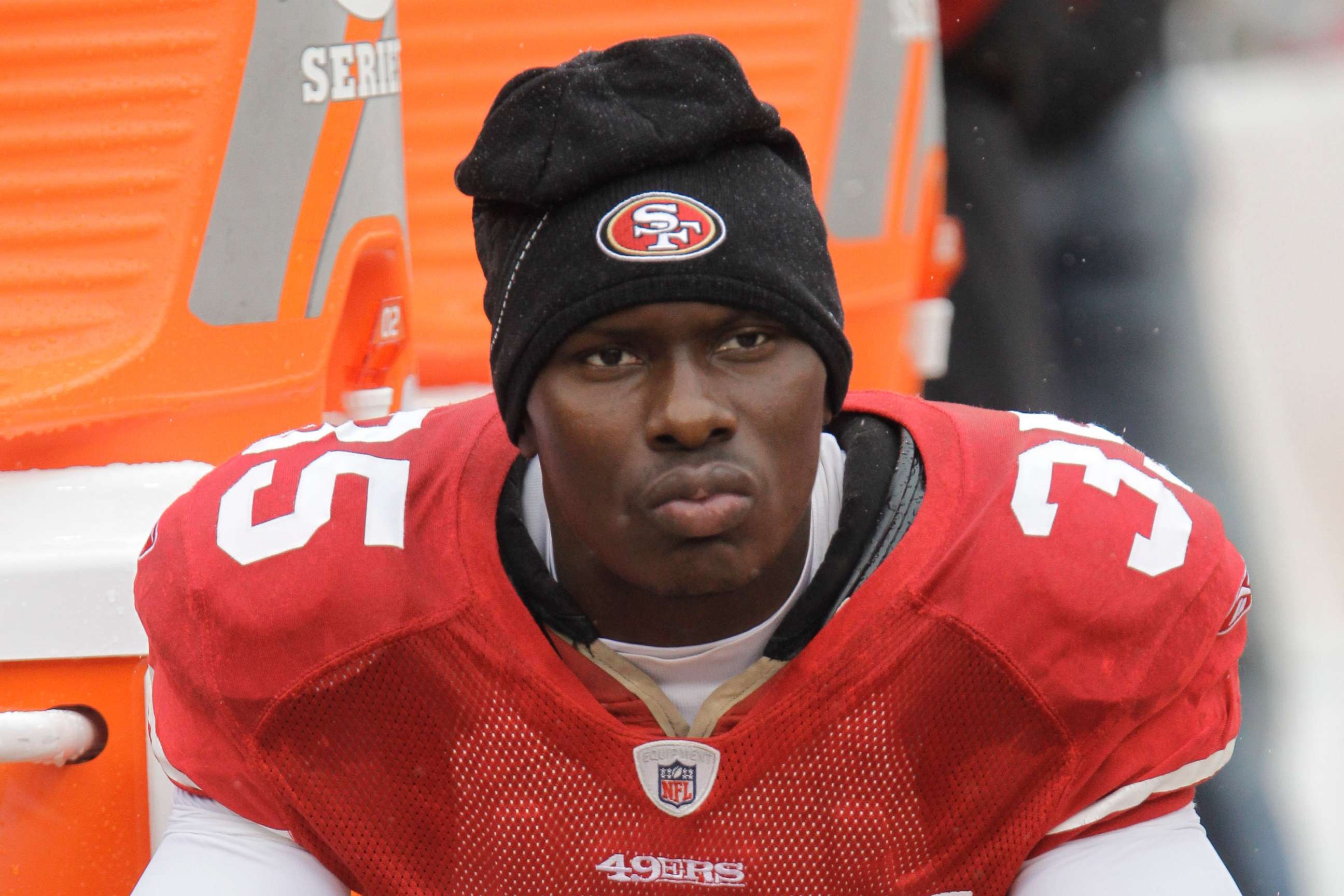 PHOTO: In this Oct. 17, 2010 file photo, San Francisco 49ers cornerback Phillip Adams sits on the sideline during the first quarter of an NFL football game in San Francisco.