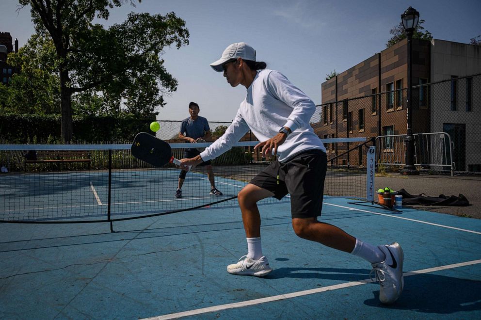 PHOTO: People play pickleball at a public court in Brooklyn, New York, on Sept. 16, 2022.