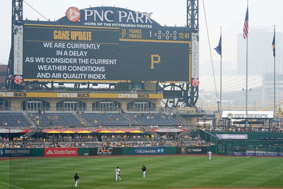 PHOTO: With the baseball game between the Pittsburgh Pirates and the San Diego Padres delayed due to haze from Canadian wildfires, Pirates starting pitcher Luis Ortiz walks to the bullpen to begin warming up at PNC Park in Pittsburgh, June 29, 2023.