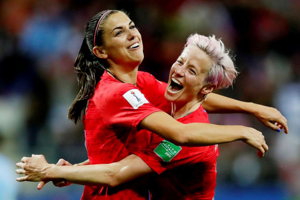 PHOTO: In this June 11, 2019 file photo, Alex Morgan of the U.S. celebrates scoring their 12th goal against Thailand in the 2019 World Cup with Megan Rapinoe.