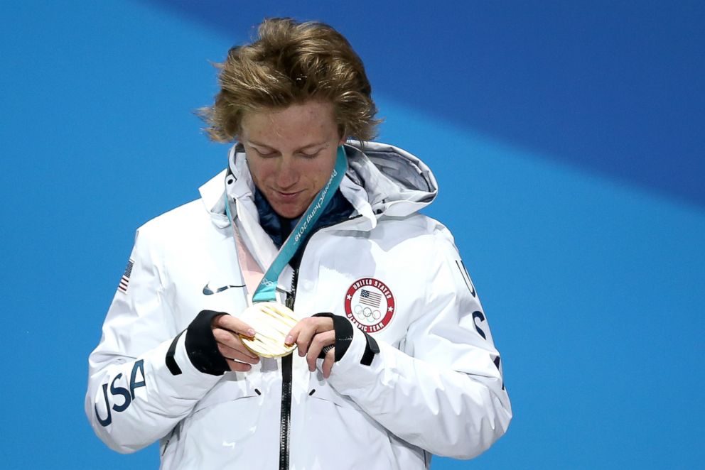 PHOTO: Redmond Gerard of the United States admiring his gold medal on the podium during the Medal Ceremony for the Men's Snowboard Slopestyle, Feb. 11, 2018.