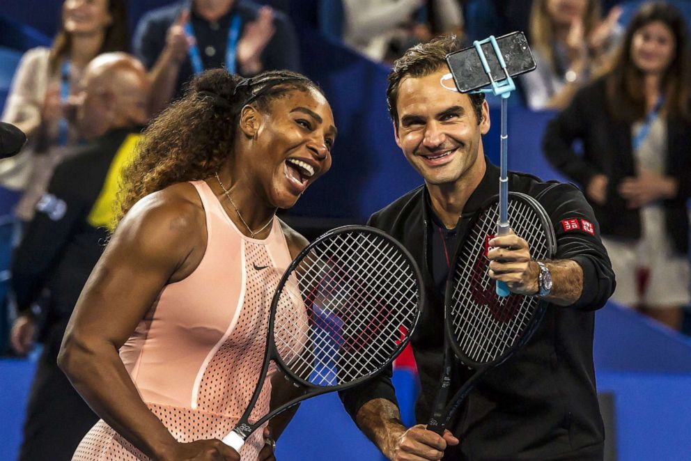 PHOTO: Serena Williams and Roger Federer take a selfie following their mixed doubles match at the Hopman Cup tennis tournament, Jan. 1, 2019, in Perth, Australia.