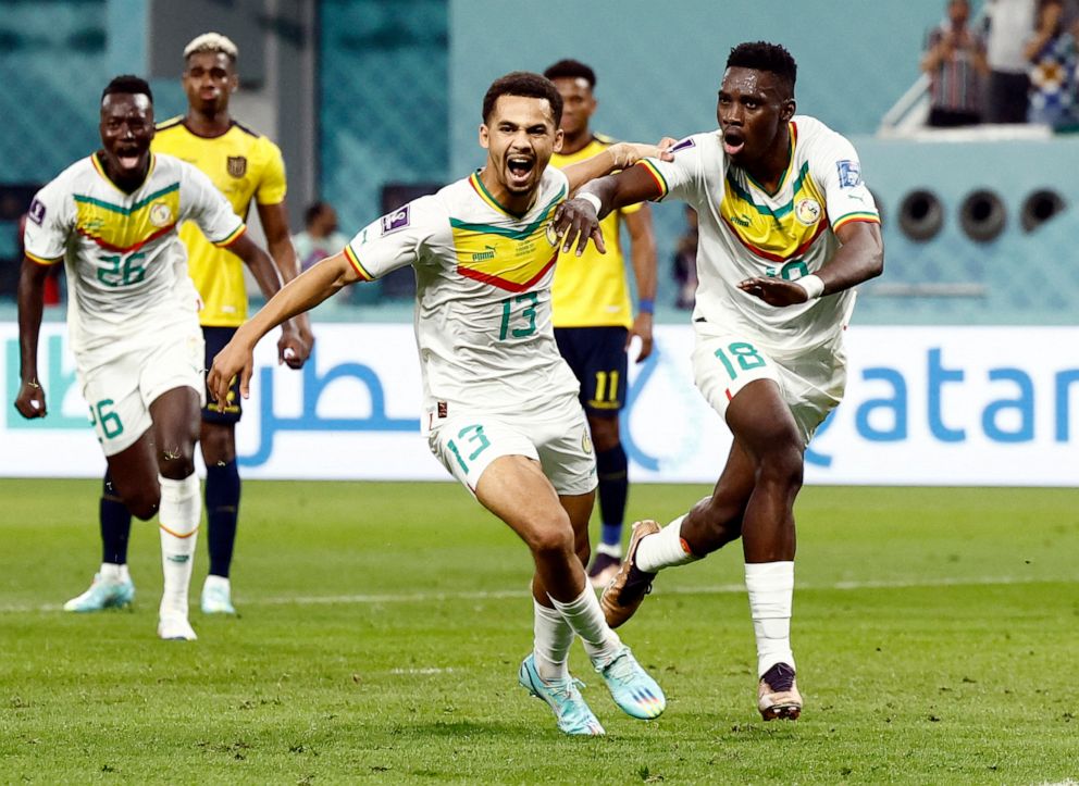 PHOTO: Senegal's Ismaila Sarr celebrates scoring their first goal with Iliman Ndiaye in their Group A World Cup match against Ecuador, Nov. 29. 2022.