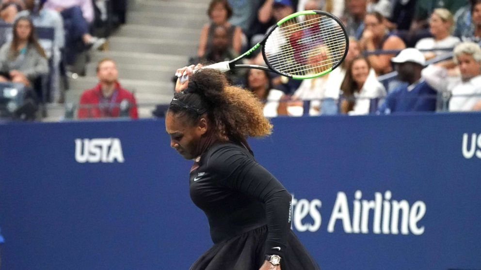 PHOTO: Serena Williams smashes her racket while playing against Naomi Osaka of Japan during their Women's Singles Finals match at the 2018 US Open in New York, Sept. 8, 2018.