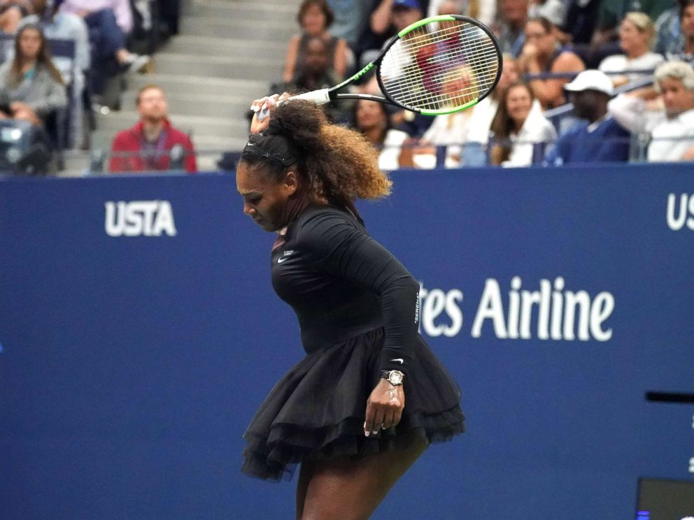 PHOTO: Serena Williams smashes her racket while playing against Naomi Osaka of Japan during their Women's Singles Finals match at the 2018 US Open in New York, Sept. 8, 2018.