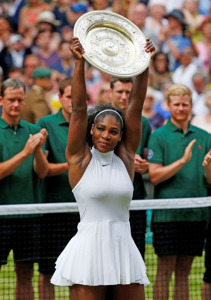 PHOTO: Serena Williams celebrates after defeating Angelique Kerber of Germany in the women's singles finals match of the 2016 Wimbledon Championship in London, July 9, 2016.