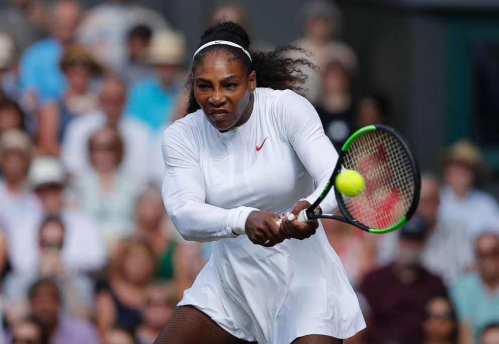 PHOTO: Serena Williams of the U.S. returns a ball to Angelique Kerber of Germany during the women's singles final match at the Wimbledon Tennis Championships, in London, July 14, 2018.