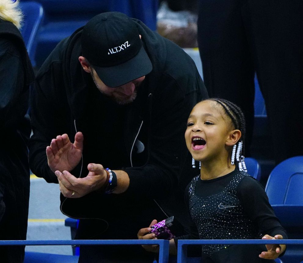 PHOTO: Alexis Ohanian and Alexis Olympia Ohanian Jr. cheer for Serena Williams during the U.S. Open in New York, Aug. 29, 2022.