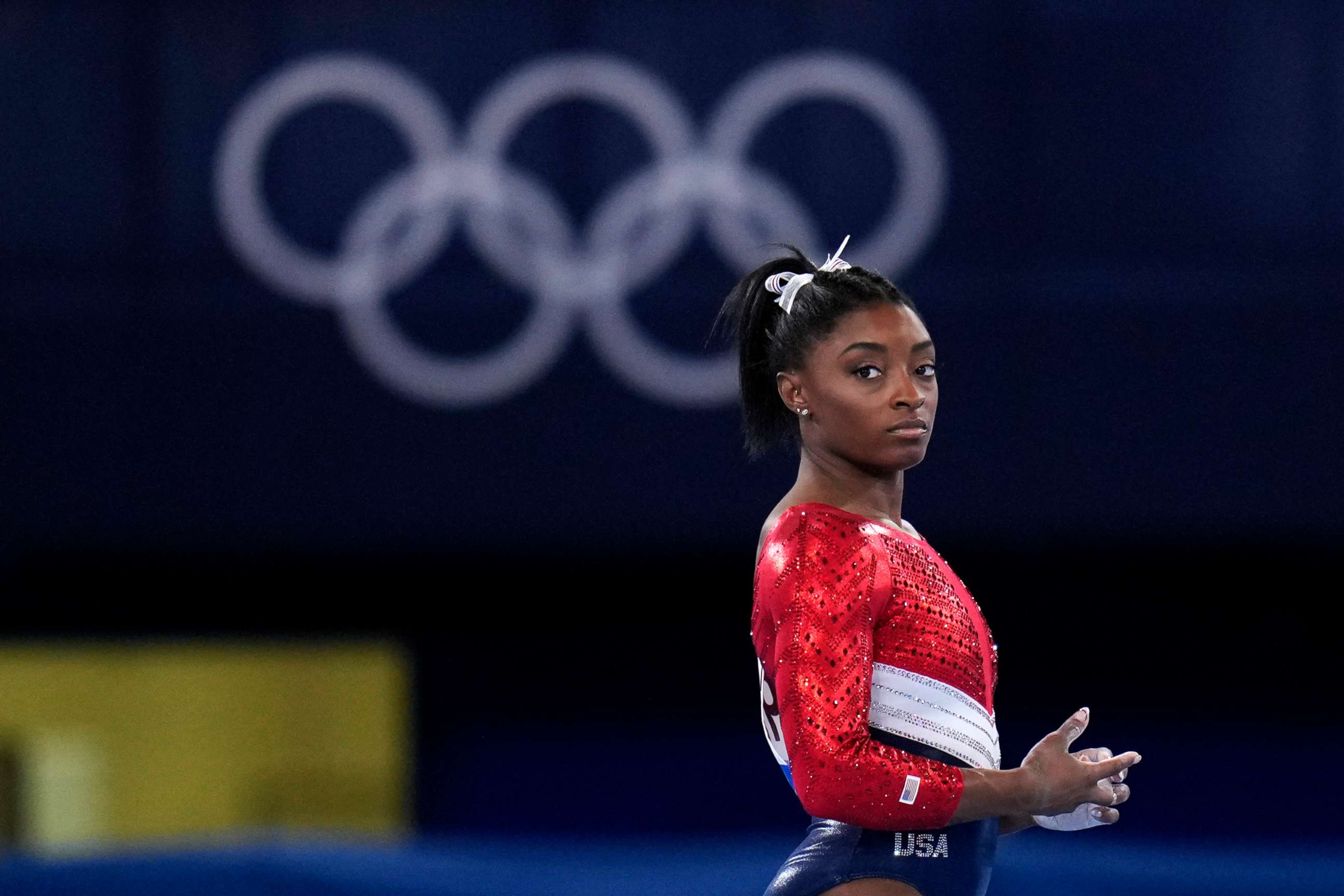 PHOTO: File-This July 27, 2021, file photo shows Simone Biles, of the United States, waiting to perform on the vault during the artistic gymnastics women's final at the 2020 Summer Olympics, Tuesday, July 27, 2021, in Tokyo.