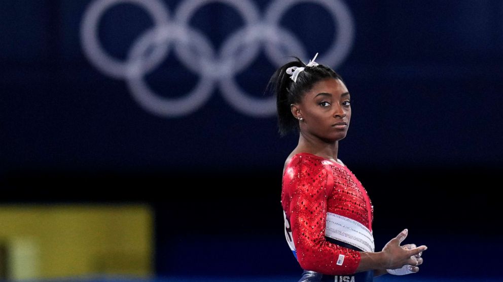 PHOTO: File-This July 27, 2021, file photo shows Simone Biles, of the United States, waiting to perform on the vault during the artistic gymnastics women's final at the 2020 Summer Olympics, Tuesday, July 27, 2021, in Tokyo.
