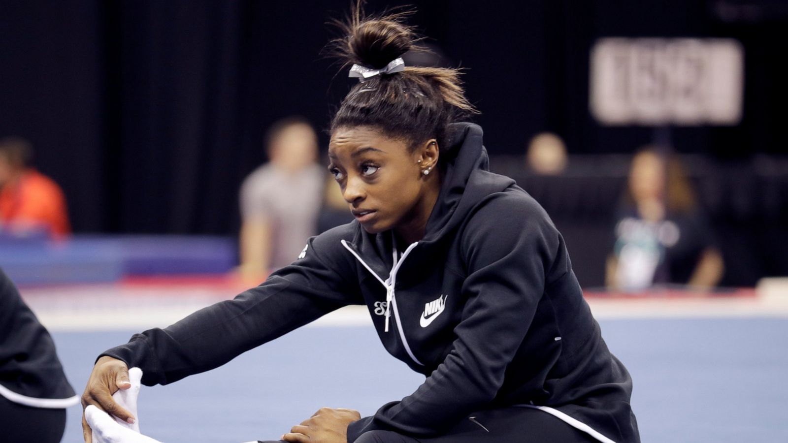 PHOTO: Simone Biles stretches during practice for the U.S. Gymnastics Championships Wednesday, Aug. 7, 2019, in Kansas City, Mo.