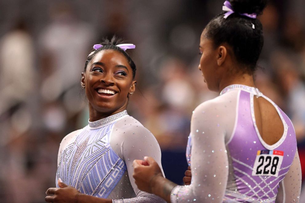 PHOTO: Simone Biles, left, and Jordan Chiles joke while warming up for the beam during the senior women's competition of the 2021 U.S. Gymnastics Championships at Dickies Arena on June 4, 2021, in Fort Worth, Texas.