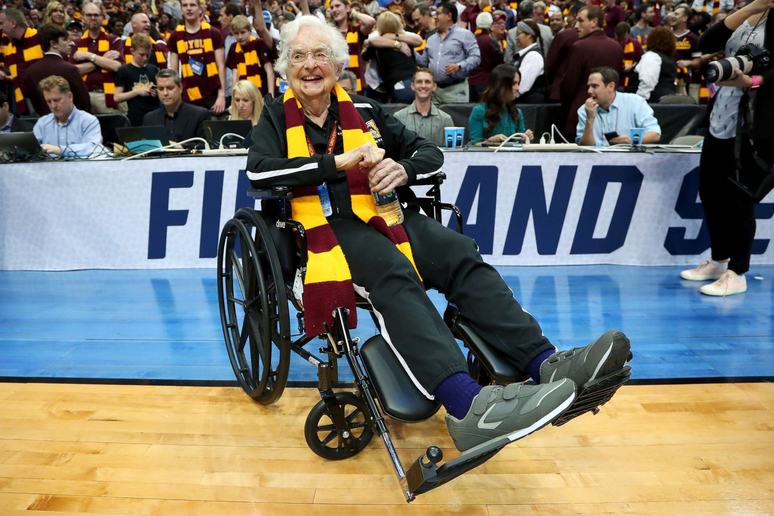 PHOTO: Sister Jean Dolores-Schmidt celebrates after the Loyola Ramblers beat the Tennessee Volunteers at the 2018 NCAA Tournament at the American Airlines Center, March 17, 2018, in Dallas.