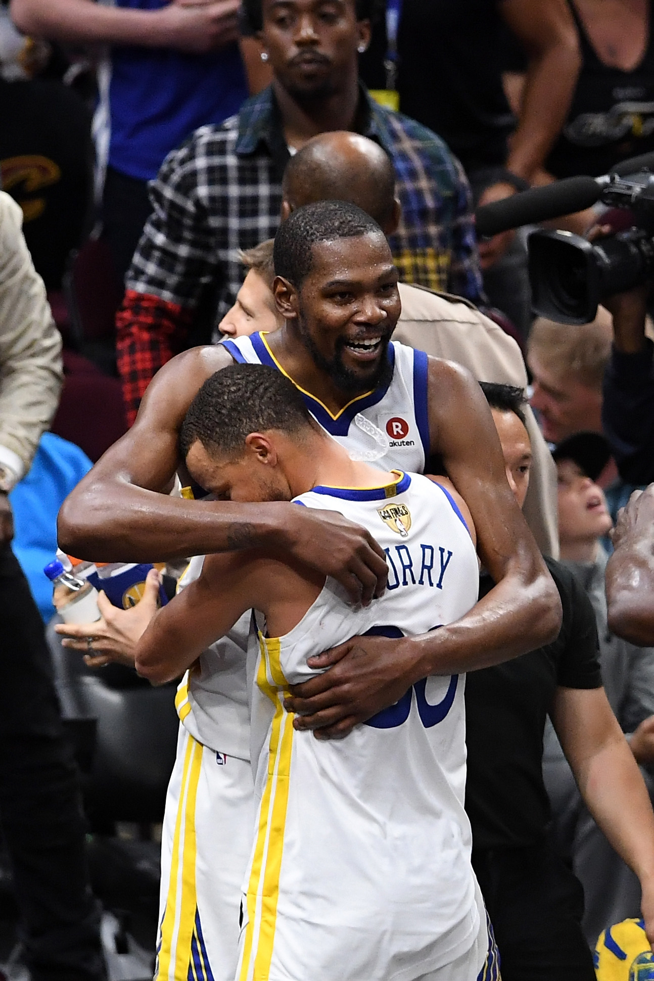 PHOTO: Stephen Curry #30 and Kevin Durant #35 of the Golden State Warriors celebrate late in the game against the Cleveland Cavaliers during the 2018 NBA Finals at Quicken Loans Arena on June 8, 2018 in Cleveland, Ohio.