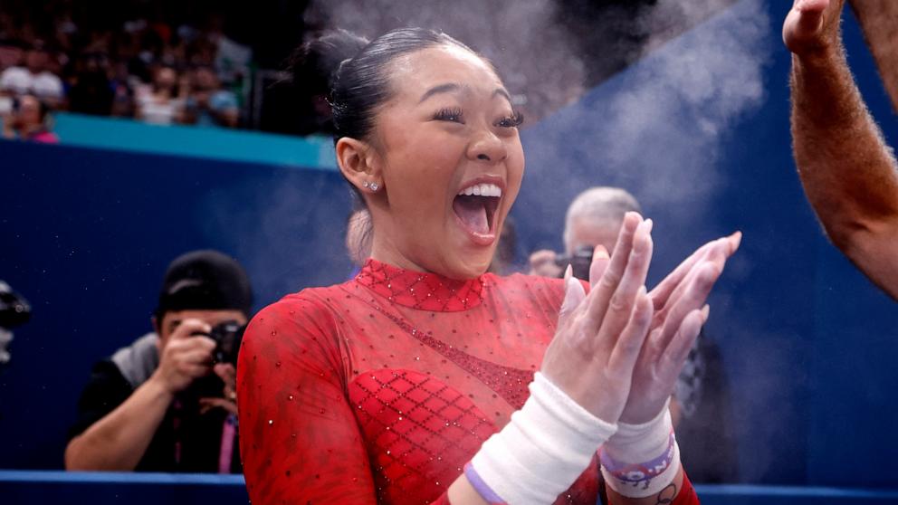 PHOTO: Sunisa Lee of United States reacts to the results of the uneven bars final at Bercy Arena in Paris during the Summer Olympics on Aug. 4, 2024. 