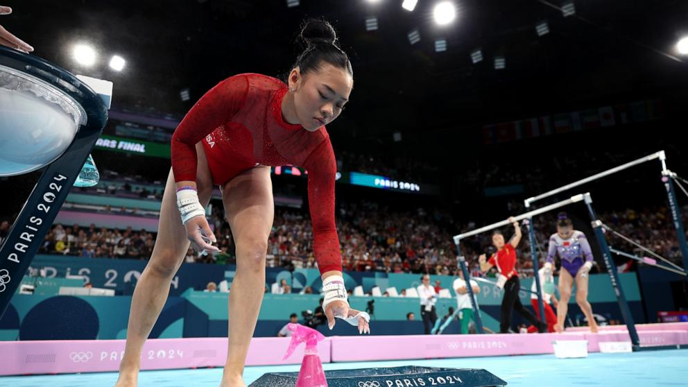 PHOTO: Sunisa Lee of Team United States prepares to compete during the Artistic Gymnastics Women's Uneven Bars Final on day nine of the Olympic Games Paris 2024 at Bercy Arena on Aug. 4, 2024, in Paris.