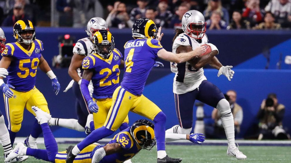 PHOTO: New England Patriots' Cordarrelle Patterson in action with Los Angeles Rams' Greg Zuerlein, Feb. 3, 2019. 