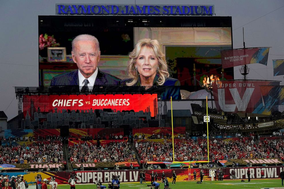PHOTO: President Joe Biden and first lady Dr. Jill Biden are seen on a scoreboard screen delivering a message before the NFL Super Bowl 55 football game between the Kansas City Chiefs and Tampa Bay Buccaneers, Feb. 7, 2021, in Tampa, Fla.