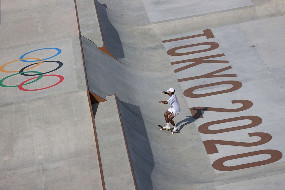 PHOTO: Nyjah Huston of the United States practices on the skateboard street course ahead of the 2020 Olympic Games on July 21, 2021, in Tokyo.