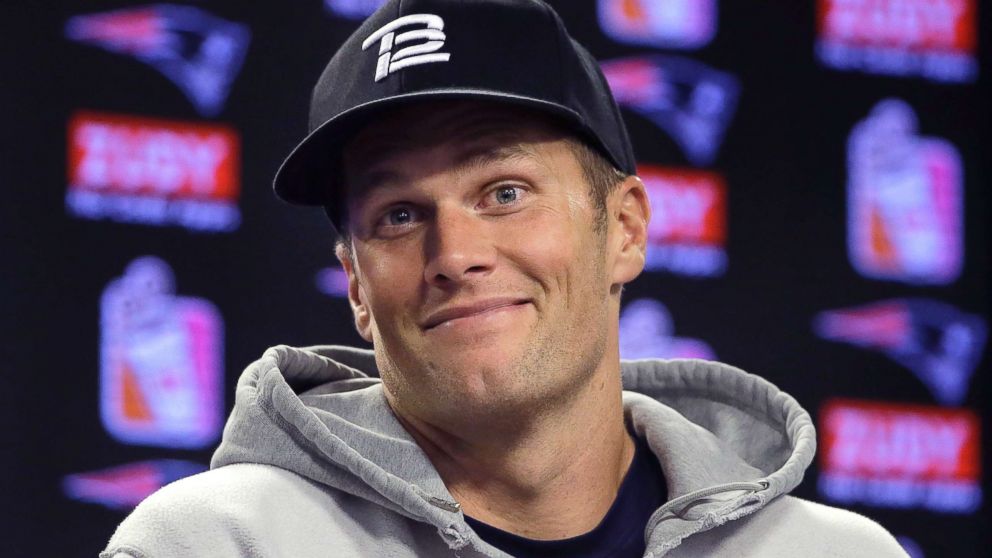 New England Patriots quarterback Tom Brady takes questions from reporters following NFL football practice, Sept. 20, 2017, in Foxborough, Massachusetts.