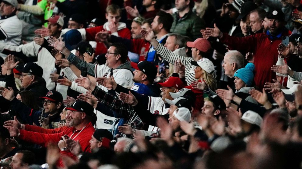 PHOTO: Atlanta Braves fans perform the tomahawk chop cheer before Game 4 of baseball's World Series between the Houston Astros and the Atlanta Braves, Oct. 30, 2021, in Atlanta.