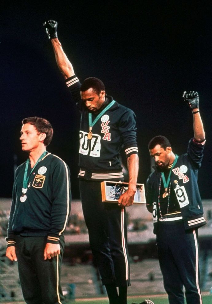 PHOTO: Tommie Smith and John Carlos raise their fists as a form of racial protest during the playing of the national anthem at the Summer Olympic Games in Mexico City, Oct. 16, 1968.