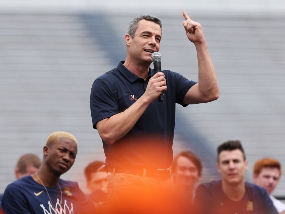 PHOTO: Virginia head coach Tony Bennett speaks during a celebration honoring the Virginia Cavaliers for winning the NCAA men's college basketball championship, Saturday, April 13, 2019, at Scott Stadium in Charlottesville, Va.