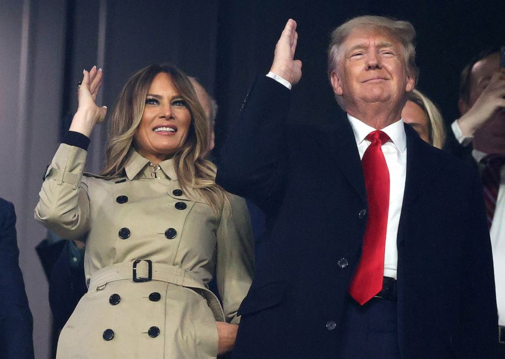 PHOTO: Former President Donald Trump and former first lady Melania Trump do "the chop" prior to Game Four of the World Series between the Houston Astros and the Atlanta Braves at Truist Park on Oct. 30, 2021, in Atlanta.