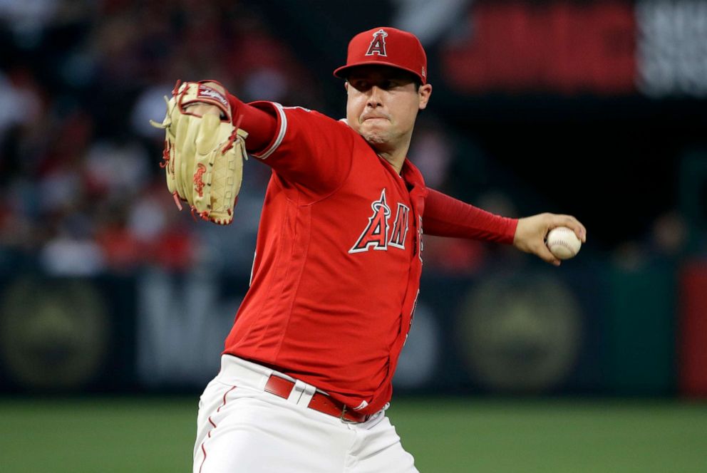 PHOTO: In this June 29, 2019, file photo, Los Angeles Angels starting pitcher Tyler Skaggs throws to the Oakland Athletics during a baseball game in Anaheim, Calif. 