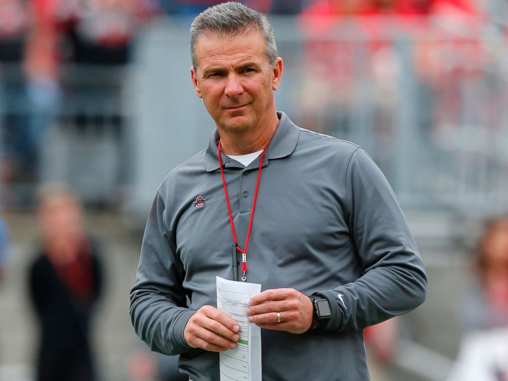 In this April 14, 2018, file photo, Ohio State coach Urban Meyer watches the NCAA college football team's spring game in Columbus. The university has placed Meyer on paid administrative leave.