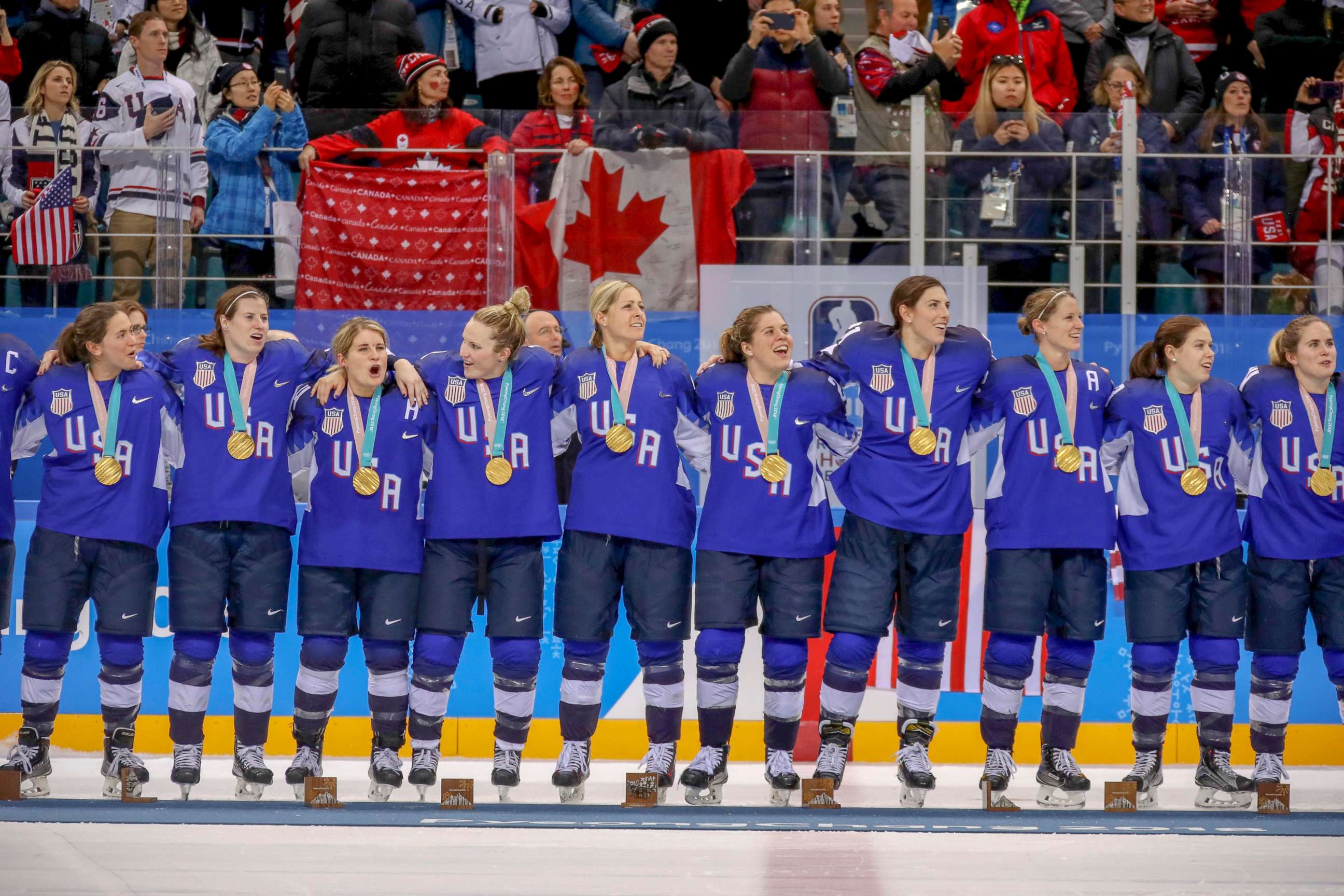 PHOTO: The members of the U.S. Women's hockey team, stand together with their gold medals around their necks, after they defeated the Canadian team in a shootout, Feb. 22, 2018.