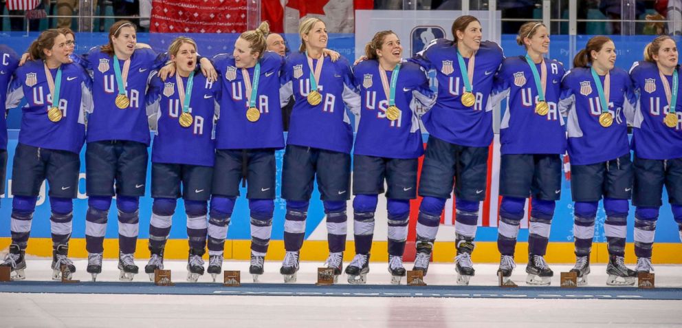 PHOTO: The members of the U.S. Women's hockey team, stand together with their gold medals around their necks, after they defeated the Canadian team in a shootout, Feb. 22, 2018.