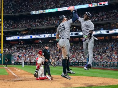 Chisholm's second straight 2-homer game helps Yanks top Phils 7-6 in 12 innings for 4th straight win
