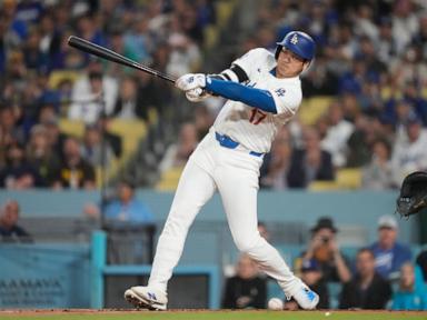 Dodgers rally with 5 runs in 7th and beat Padres 7-2 to clinch 11th NL West title in 12 years