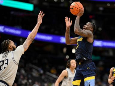 Kam Jones has his fifth double-double to lead No. 21 Marquette past Georgetown 76-61