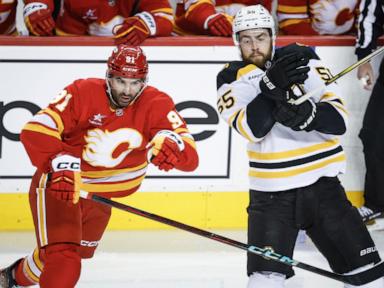 Pastrnak scores in OT as Bruins rally to beat Flames 4-3