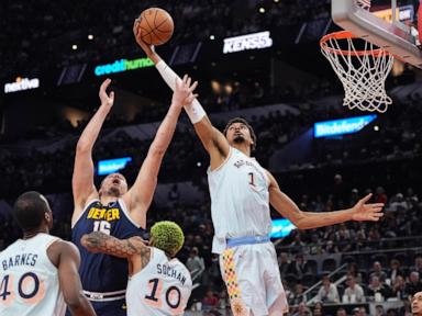 Jokic and Nuggets beat the Spurs 122-111 in overtime to spoil Wembanyama's 21st birthday